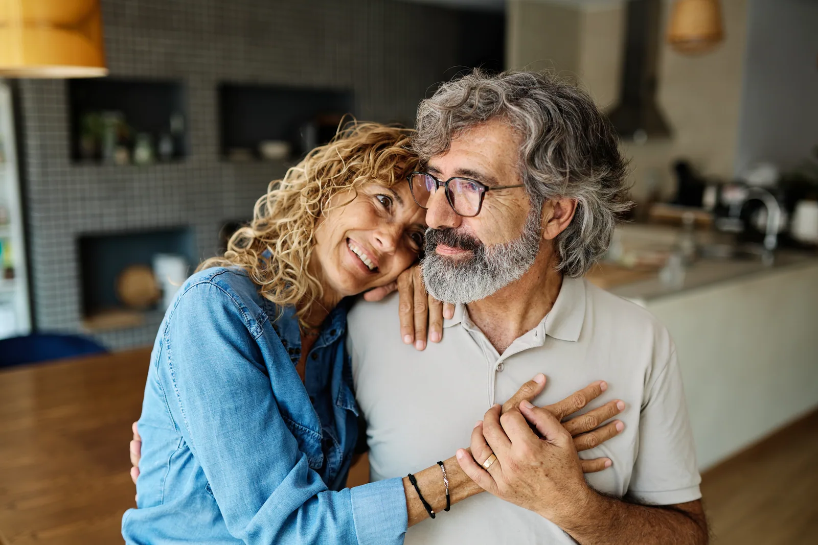A smiling couple embracing