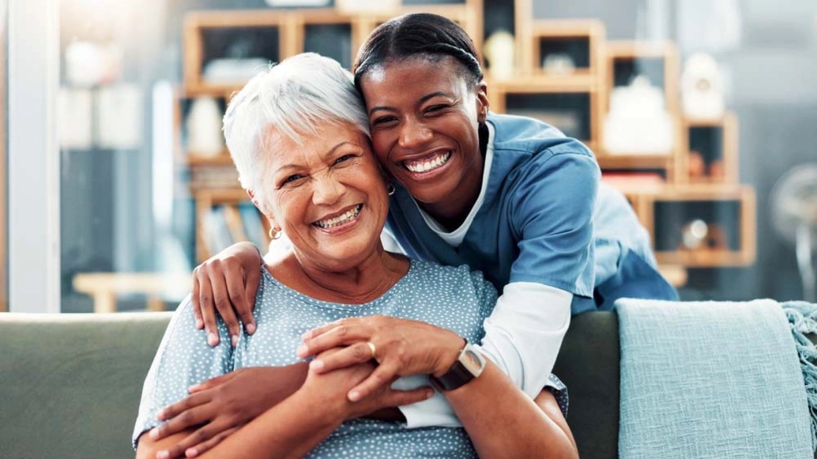 Patient smiling with a supportive caregiver