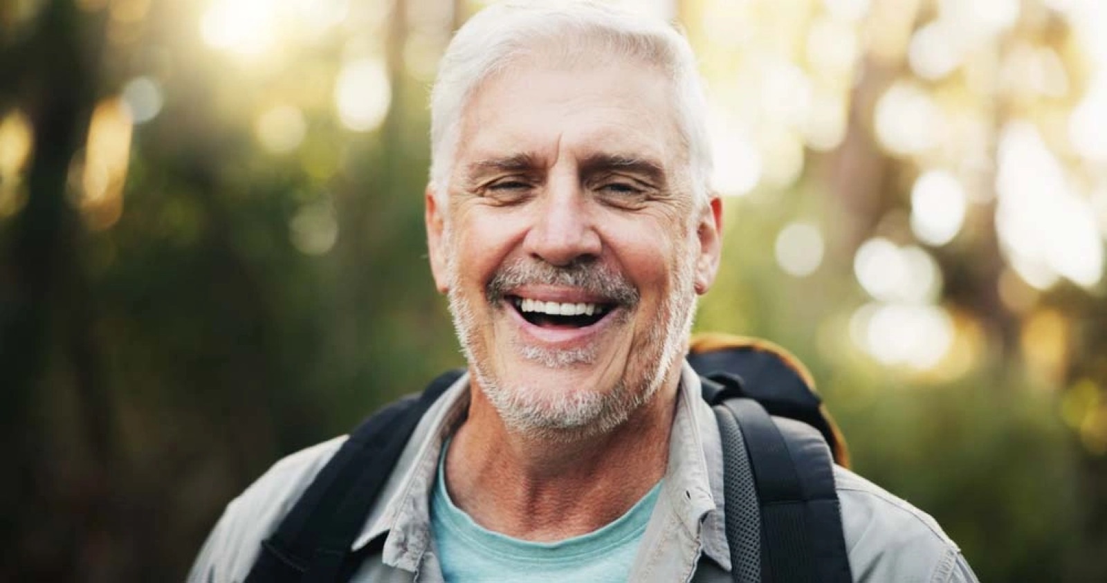 Older patient smiling outdoors