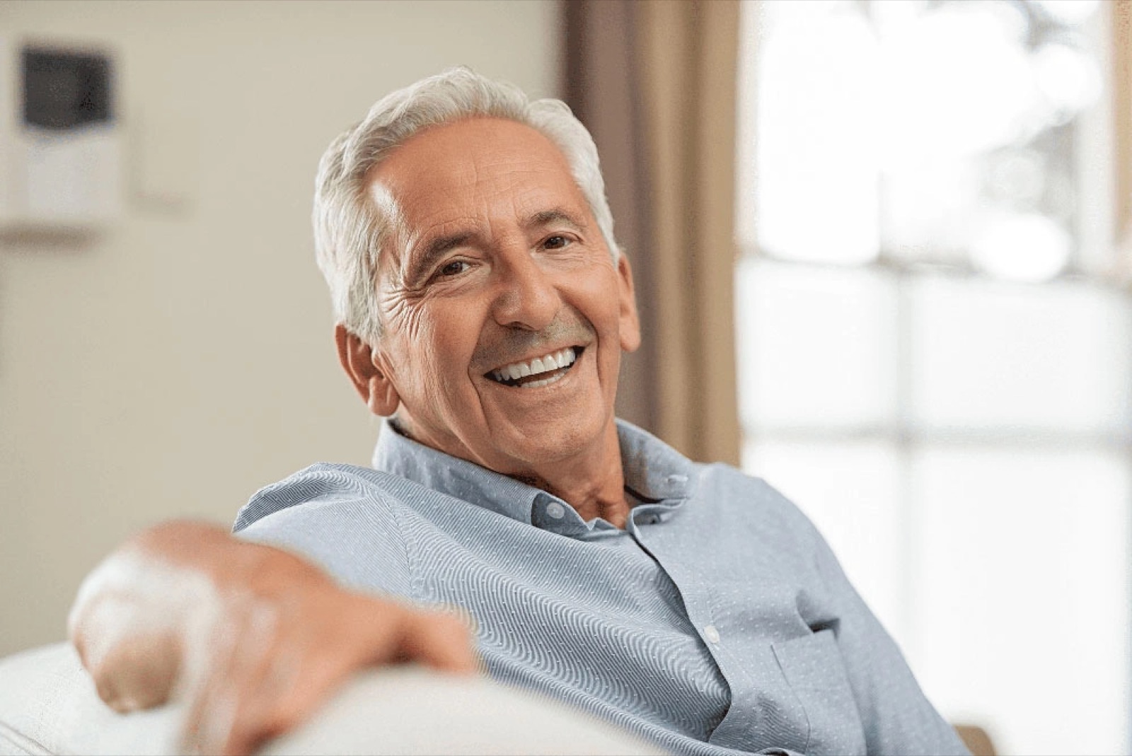 Senior dental patient smiling